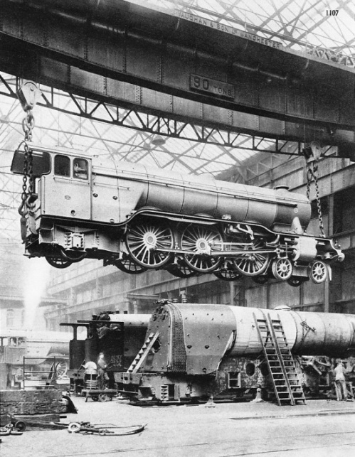 A 90-tons three-cylinder “Pacific” engine, built by the North British Locomotive Company for the LNER, lifted by a giant travelling crane