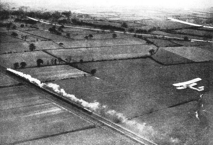 the “Flying Scotsman” accompanied on its northward journey by the Imperial Airways liner, “Heracles”