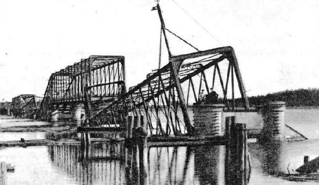 Wrecked railway bridge across the Lielupe near Riga