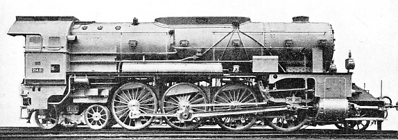 EIGHT-COUPLED WHEELS of 6 ft 5-in diameter are a remarkable feature of this Austrian express engine