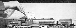 MINOR ADJUSTMENTS being made to a miniature 2-8-0+0-8-2 Garratt locomotive