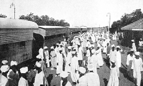 A TYPICAL SCENE on the platform in a station of tropical Africa