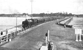 A mail train of the Federated Malay Slates Railways on its journey from Singapore to Kuala Lumpur