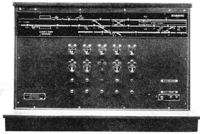 This Control Panel at Wembley Park operates the points and signals at Stanmore and shows by means of little lamps the movements of all trains between that station and Edgware