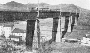 A STEEL BRIDGE OF FIVE SPANS at Ormaiztegui, 357 miles north of Madrid