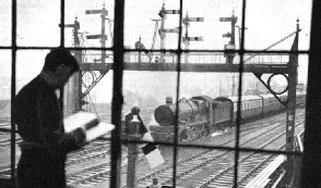 A SIGNAL GANTRY viewed from a signal-box at Reading