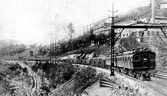 A COAL TRAIN OF FORTY-THREE LADEN CARS CLIMBING THE ELKHORN GRADE