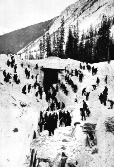 CLEARING A SNOW SLIDE BY HAND