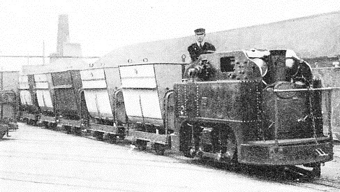Engine No. 18, built in 1902, is here seen hauling a train of tip wagons