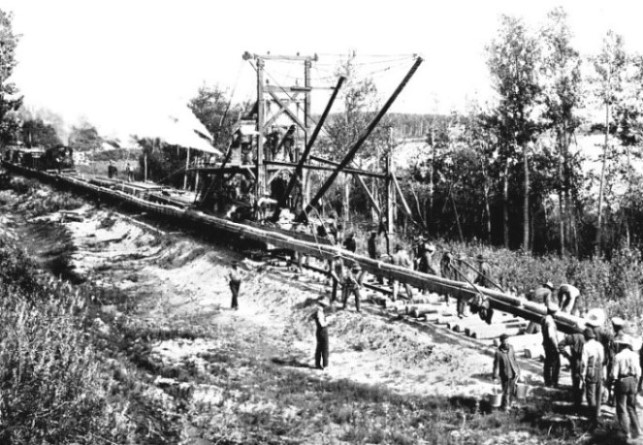 LAYING THE RAILS with the Hurley track-layer