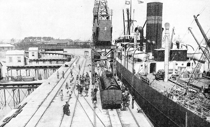 UNLOADING A LOCOMOTIVE from the SS Clan Mackenzie for the Rhodesia Railways