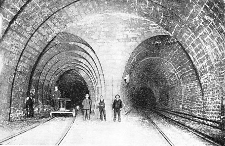 THE FIRST TUNNEL contained a station about half-way.