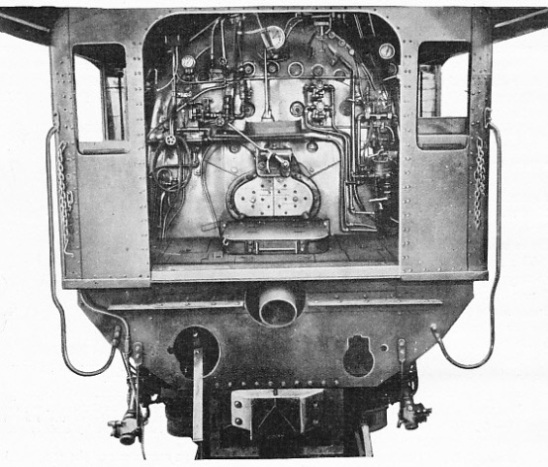 LOCOMOTIVE CAB SHOWING ELVIN STOKER IN POSITION