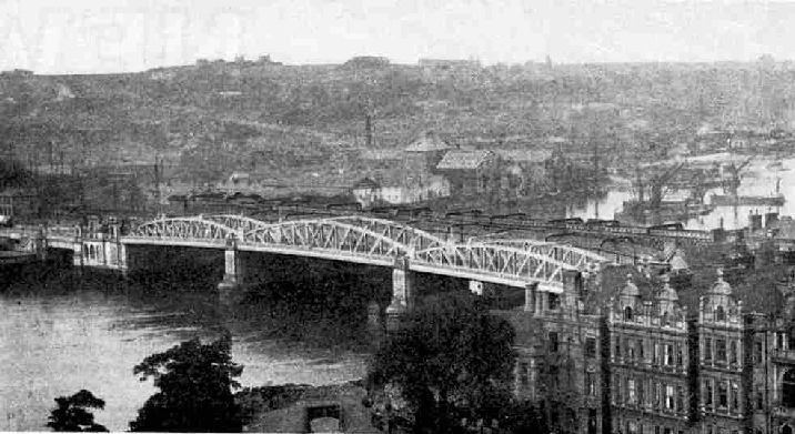 This fine lattice-girder bridge crosses the Medway at Rochester