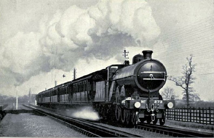 AN EAST COAST EXPRESS PICKING UP WATER AT FULL SPEED
