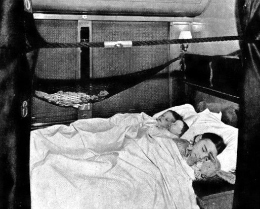 A Pullman car section turned into sleeping quarters for the night