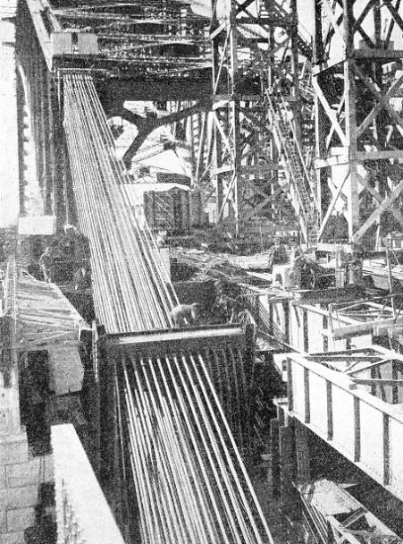 ANCHORAGE ROPES being dismantled at the South Pylon after the closing of the main arch