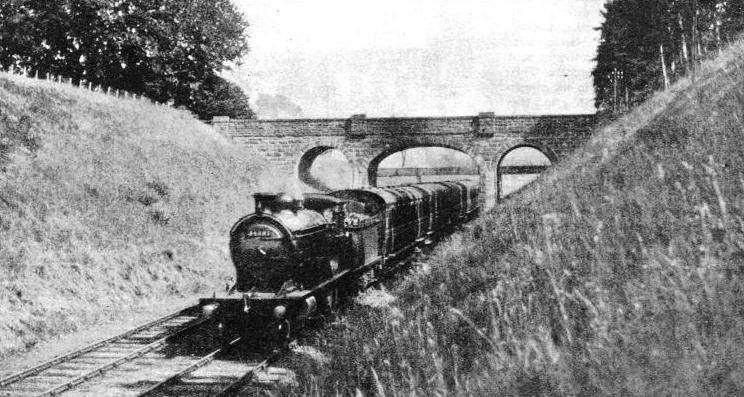 A through Glasgow to Inverness train near Millburn Junction